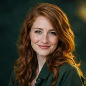 Woman with red hair in a green jacket